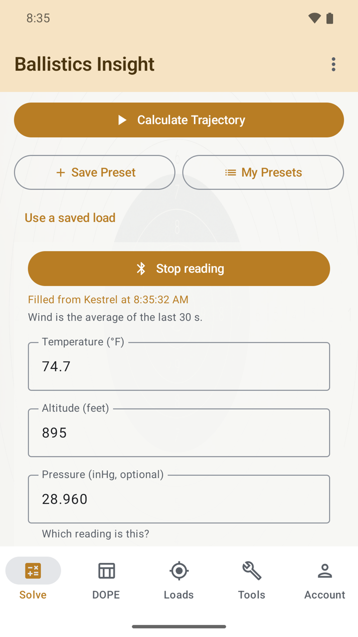 The Solve tab reading a meter live: a Stop reading button, the note Filled from Kestrel at 8:35:32 AM, Wind is the average of the last 30 s, and fields showing 74.7 degrees F, altitude 895 feet and pressure 28.960 inHg.