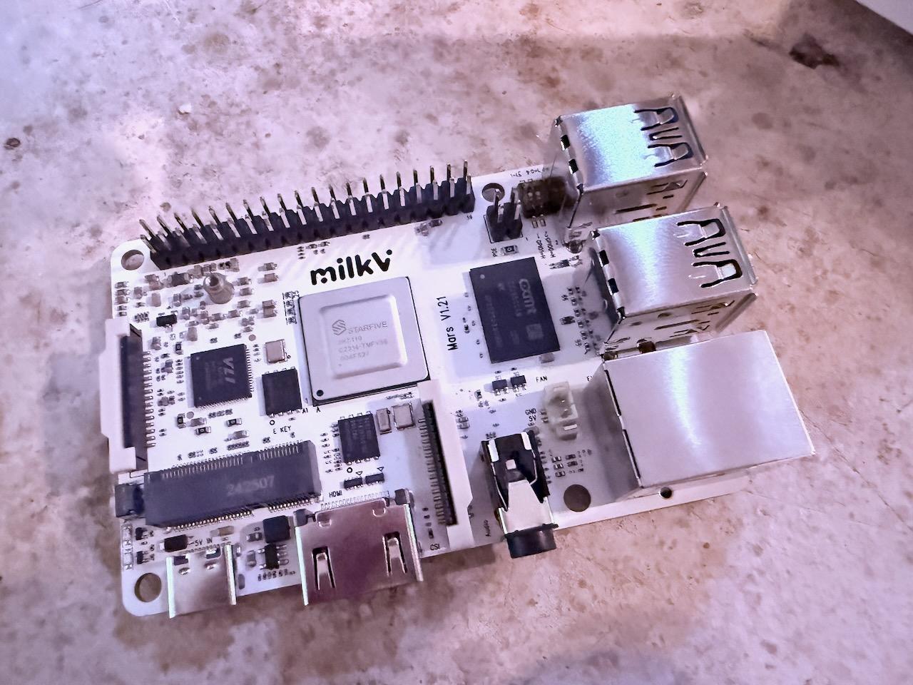 Milk-V Mars V1.21 board, top view: StarFive JH7110, 40-pin header, and the two-position boot DIP switch next to the USB3 stack