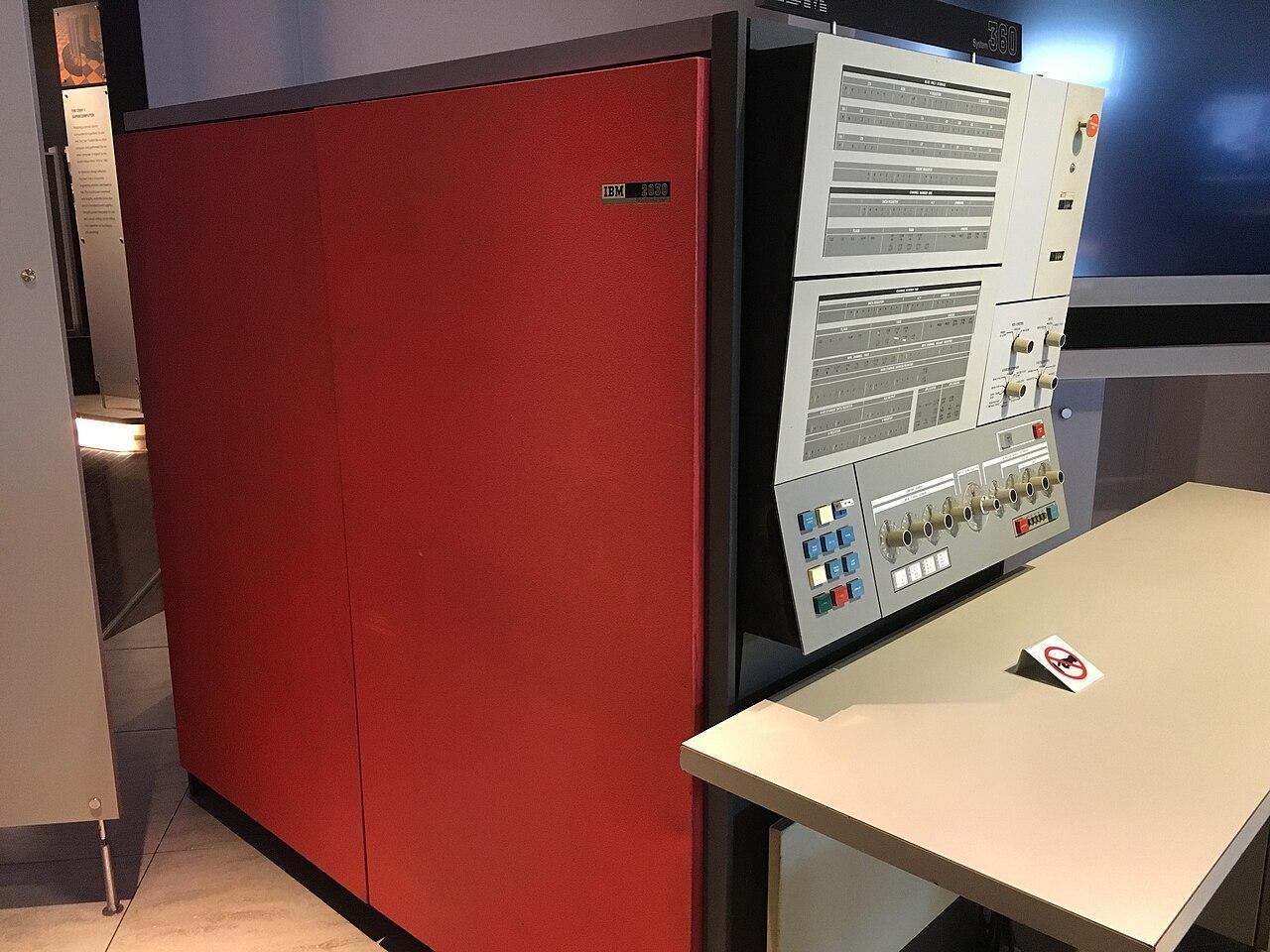 An IBM System/360 Model 30 mainframe computer with its distinctive red cabinet and operator control panel