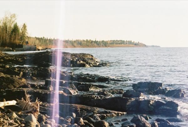Rocky lakeshore with corrected horizon